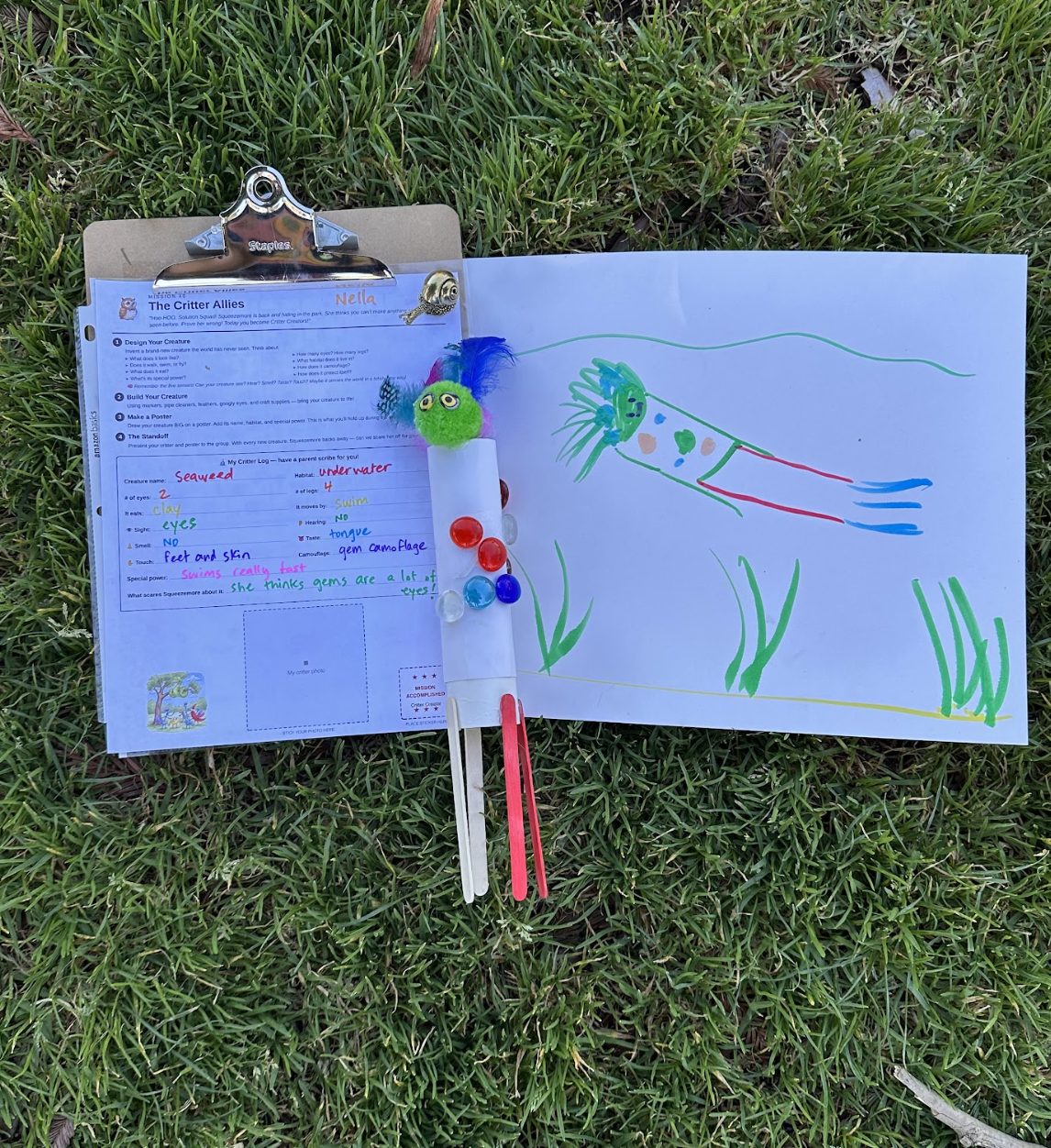 A finished handmade critter creature beside a field-notes worksheet titled The Critter Allies