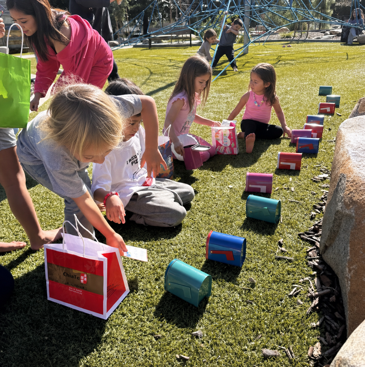 A child carefully cutting and fitting plastic mesh into an enclosure.