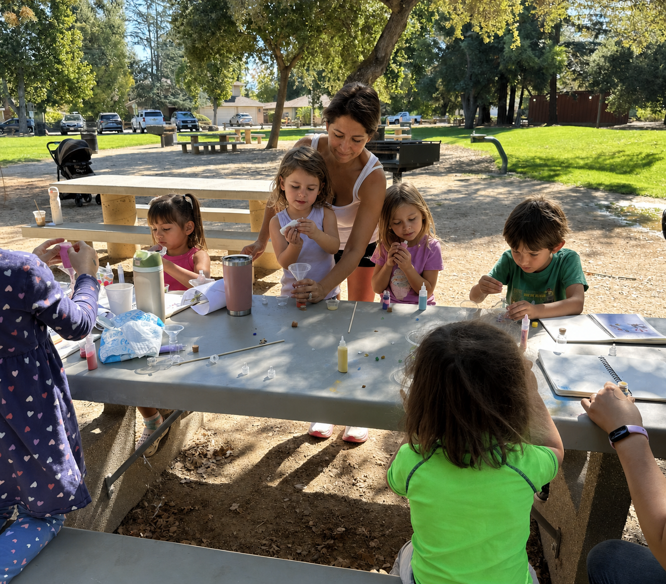 A child carefully observing a melting substance over a safe heat source.