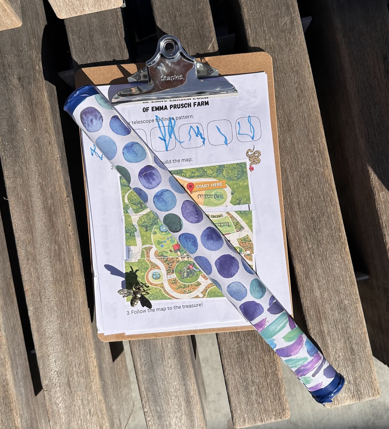 An Explorer peers through her newly calibrated, hand-decorated Galilean telescope to decode a distant clue along the orchard fence.